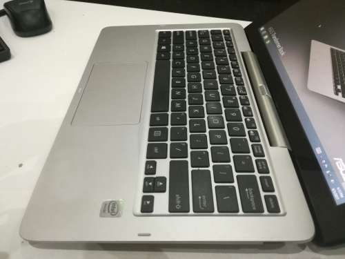 AS NEW*ASUS TRANSFORMER*2 IN 1*INTEL ATOM Z3775*2GB RAM*500GB HDD/32GB SSD*